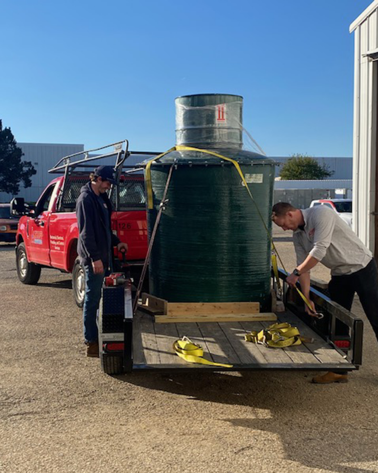 Lift tank for a pool house loading up the truck 2