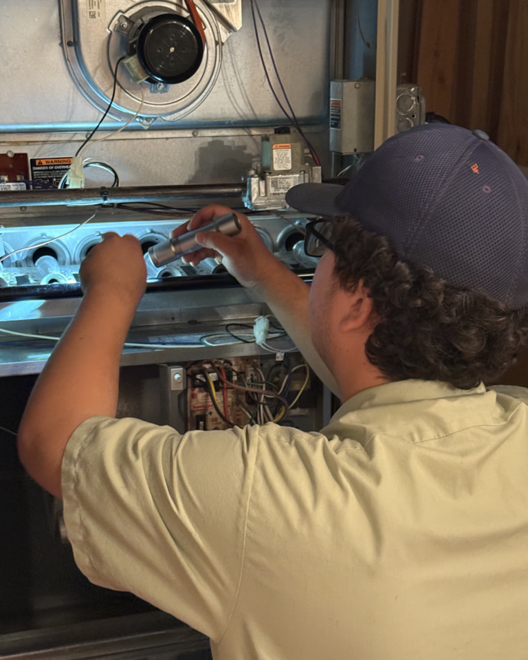 Nick cleaning the furnace