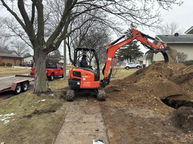 an althoff tech, operating an excavator to install sewer lines