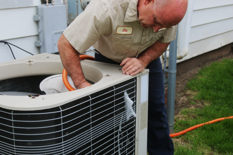 using the hose to clean out AC